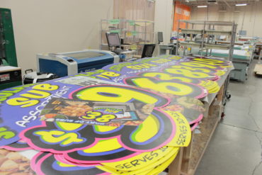 large format signage being produced in the Alexander's warehouse