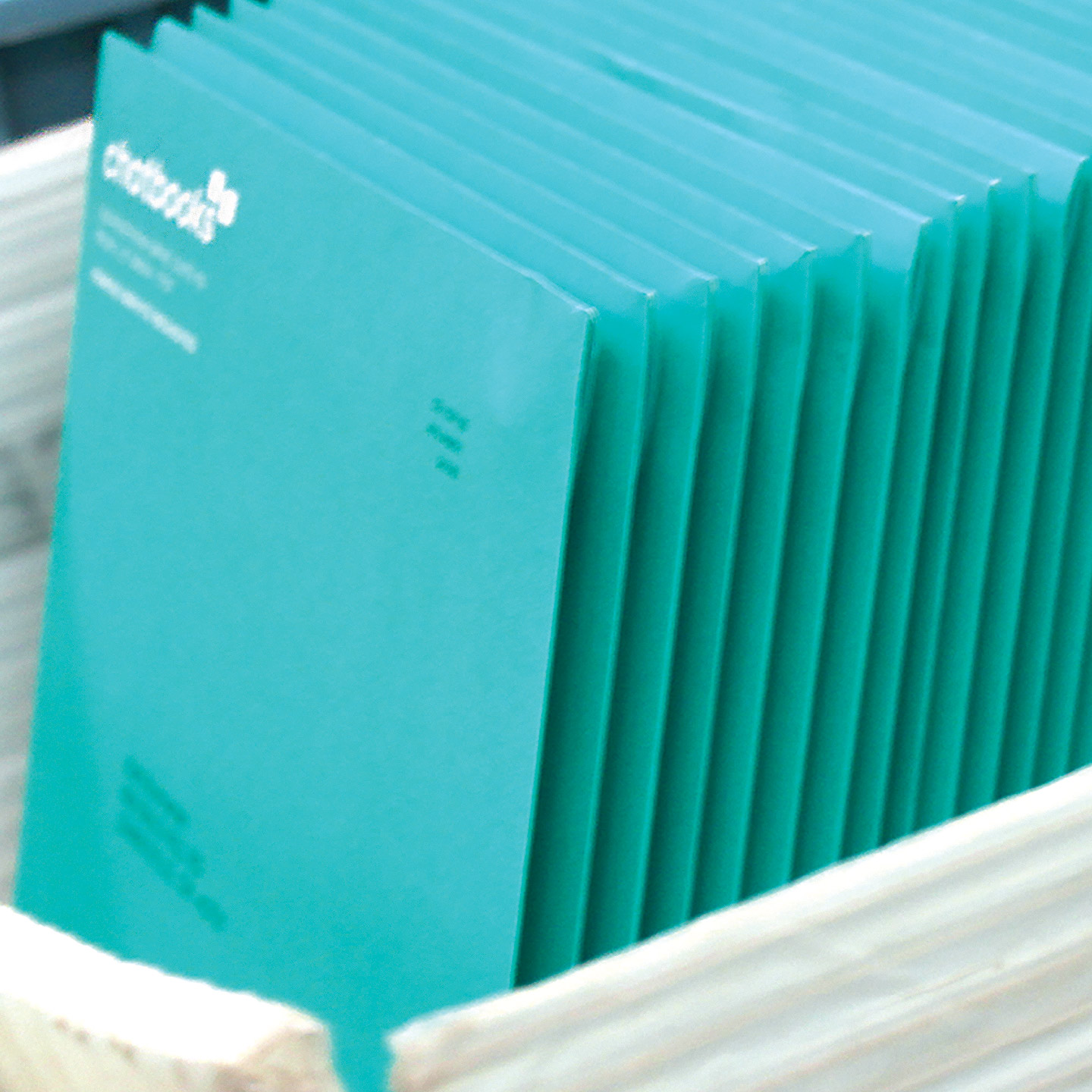 stack of chatbooks packages