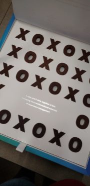 The tray of X and O chocolates included in the Qualtrics marketing kit.